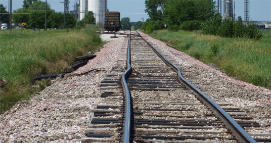Railroad Track With Sun Kinks